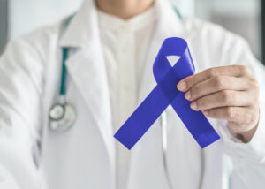 colorectal cancer awareness on medical doctor's hand support