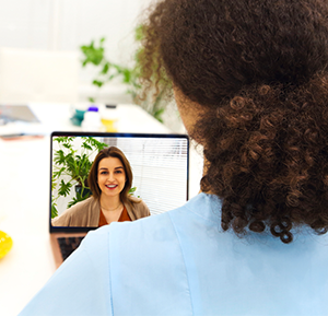 Woman doing a telemedicine consultation through her online patient portal system.