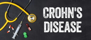Stethoscope, pharmaceuticals and Crohn's disease on a blackboard.