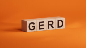 The word GERD is written on wooden cubes.